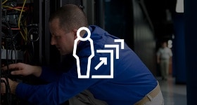 Man fixing a server.