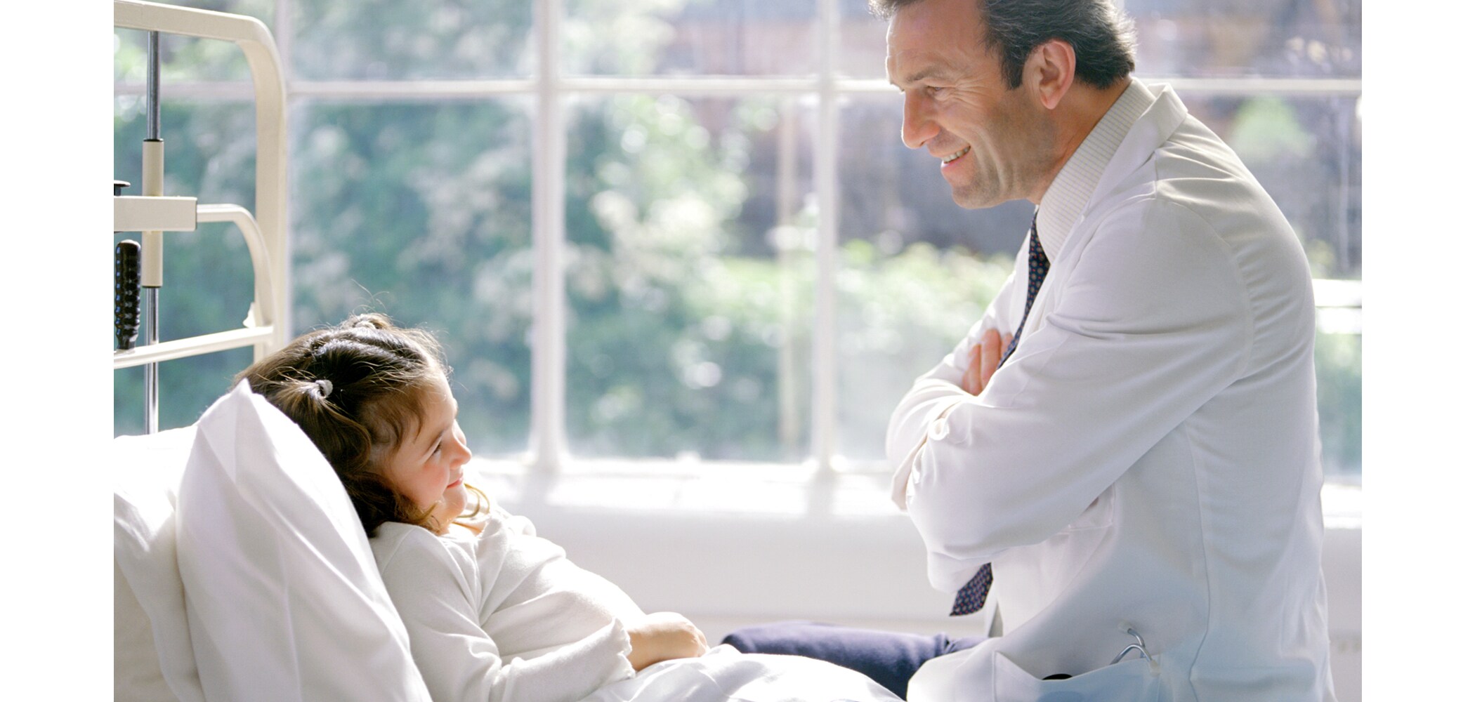 Image of doctor speaking with a patient