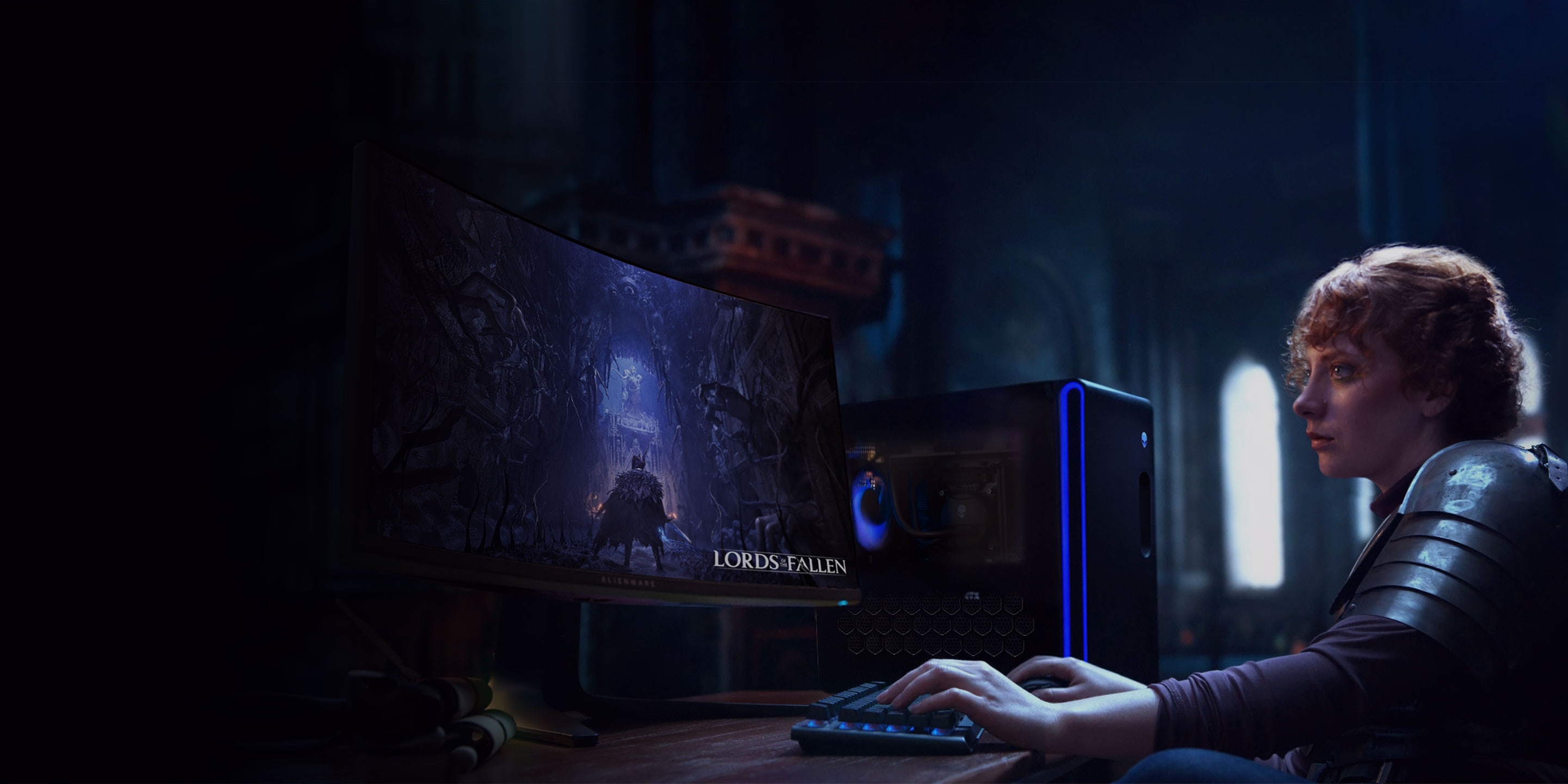 Gamer wearing armor plays Lords of the Fallen on an Alienware Aurora R16 in a castle setting. 
