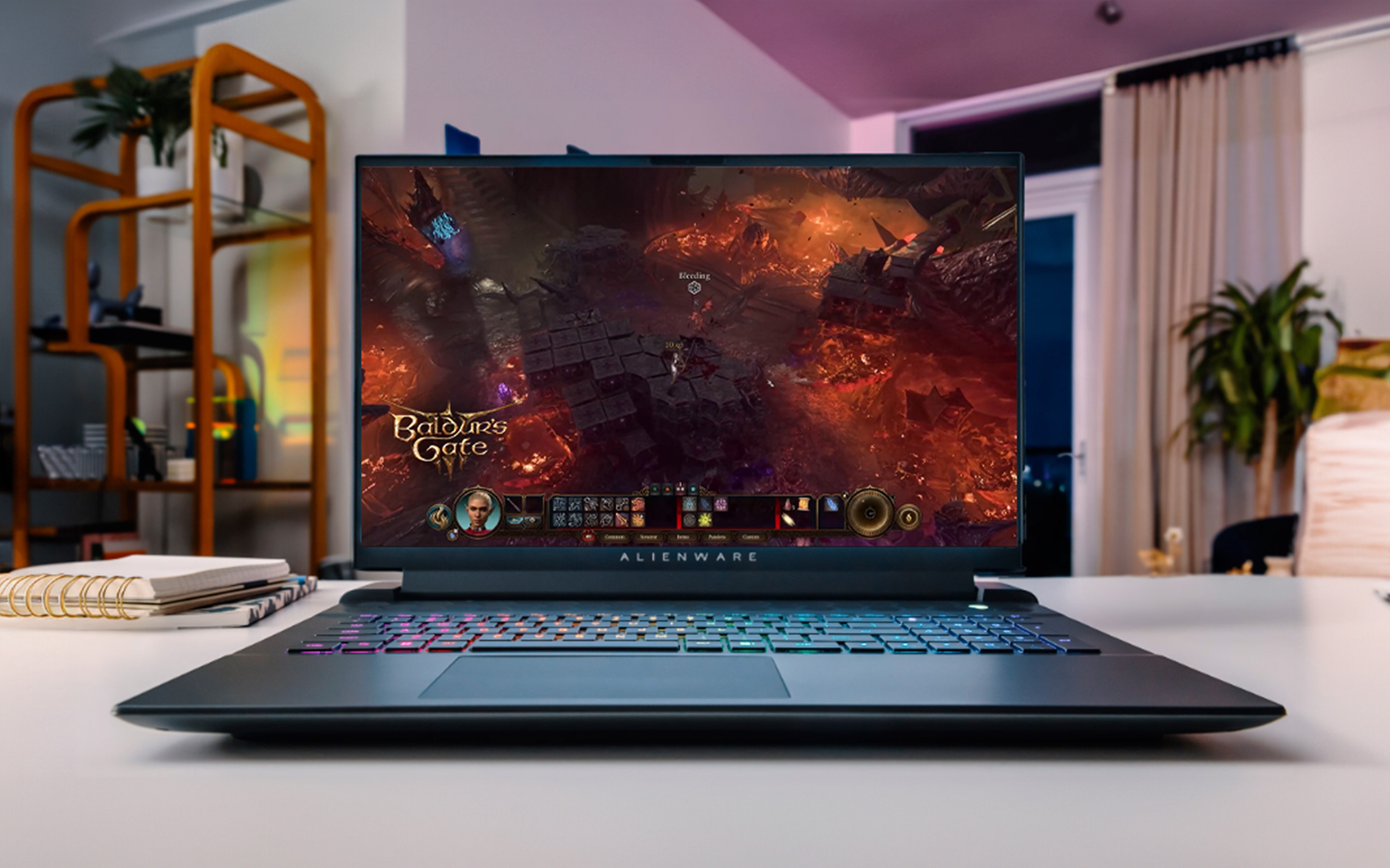 Frontal view of an Alienware M18 R2 laptop positioned on a table within a living room setting, showcasing dyanmic gameplay from Baldur's Gate animated vividly on its screen. 