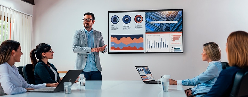 Man presenting a document on a Dell C5519QA Monitor.