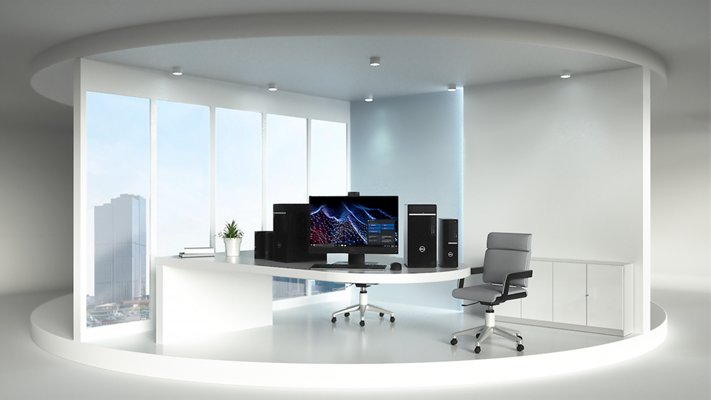 Pictureof a bright, spacious room with office furniture.On a white table, Dell products and OptiPlex 5000 Tower Desktops.