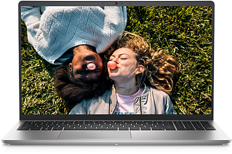 Picture of a Dell Inspiron 15 3520 Laptop with two girls lying on the grass and making bubble gum on the screen.