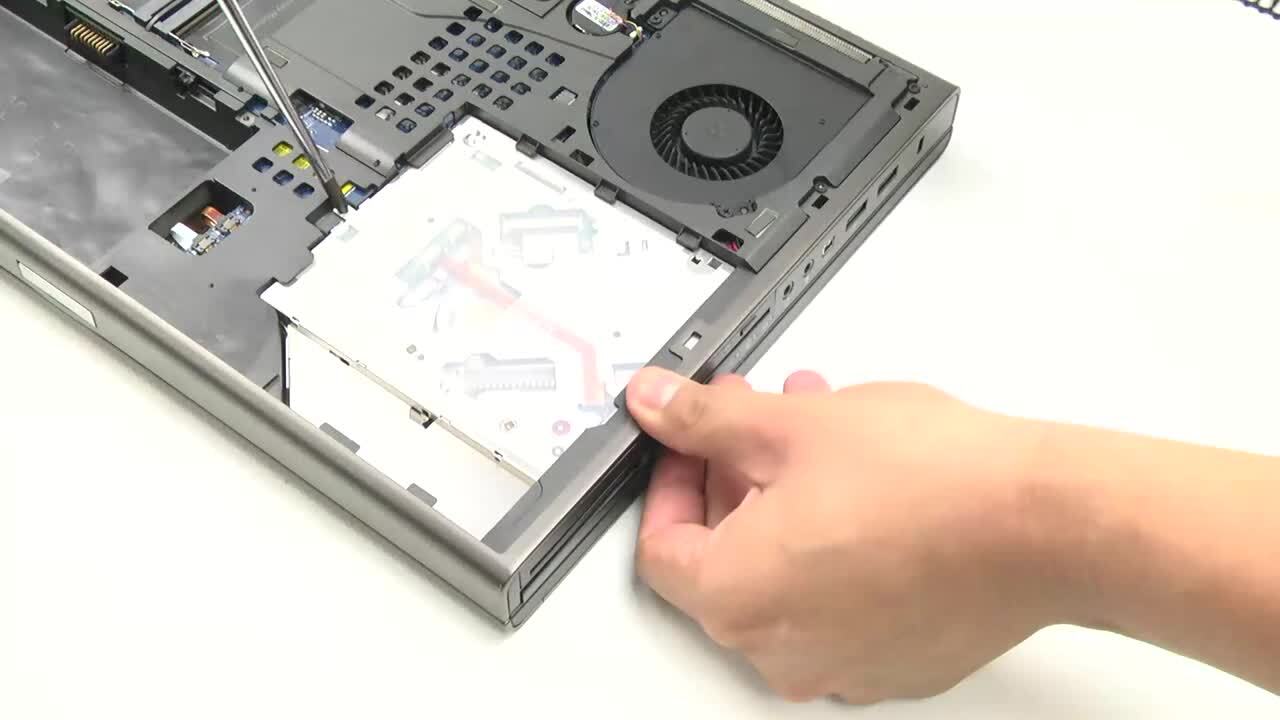 How to Replace the Optical Drive in a Dell Notebook